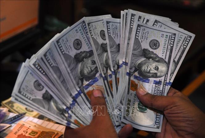 Đồng USD giằng co giữa dữ liệu kinh tế tích cực và áp lực chính trị